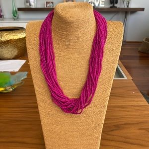 Fucia multi strand bead necklace
